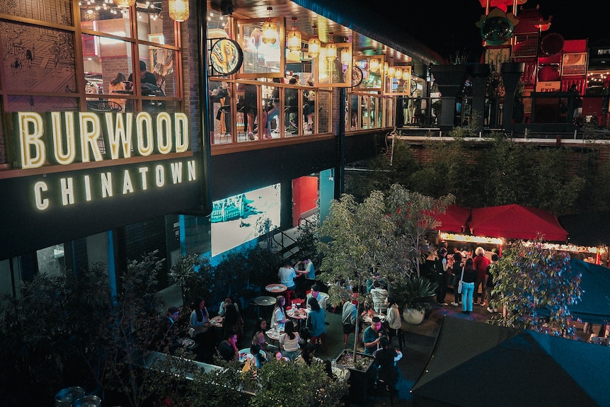 A photo of a neon sign saying Burwood Chinatown in Sydney.