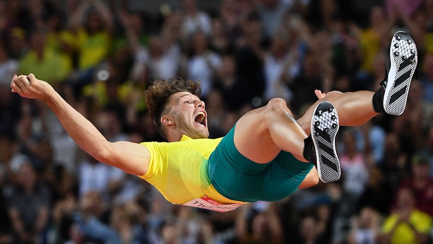 Kurtis Marschall of Australia celebrates as he falls to the mat.