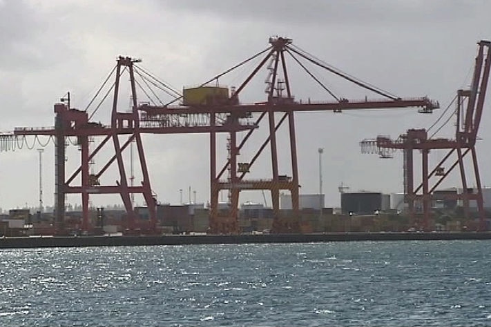 Wide shot Fremantle Port with cranes aganst the skyline