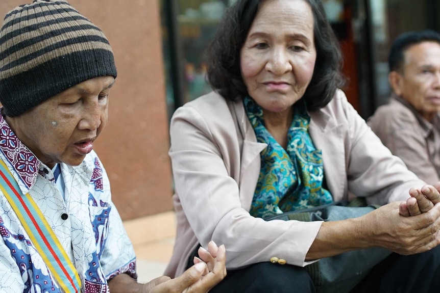 Waria waiting for a church-sponsored health check-up.