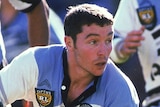 An archive photo of Paul Green passing the ball for Cronulla during a match in 1996.