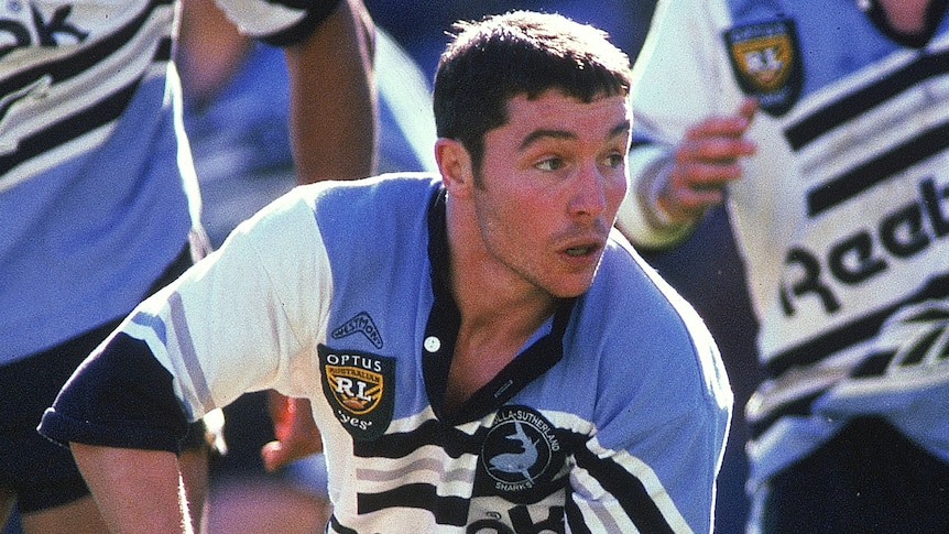 An archive photo of Paul Green passing the ball for Cronulla during a match in 1996.