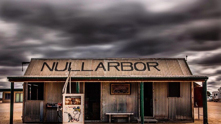An old tin shed with 'Nullarbor' in big letters on the roof.