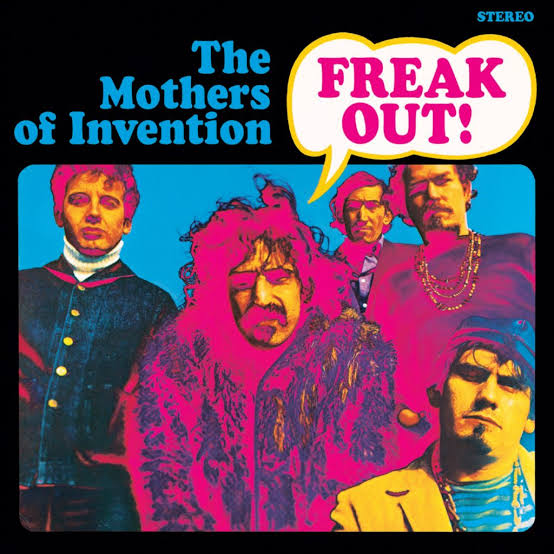 A psychedelic-looking image of the five band members