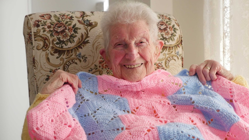 Biddy Abrahams shows off some of her crochet work