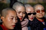 Yuan Shanshan, Li Wenzu, Liu Ermin, Wang Qiaoling don shaved heads for the media