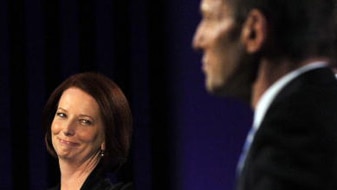 Gillard and Tony Abbott  at The National Press Club (Getty Images: Pool)