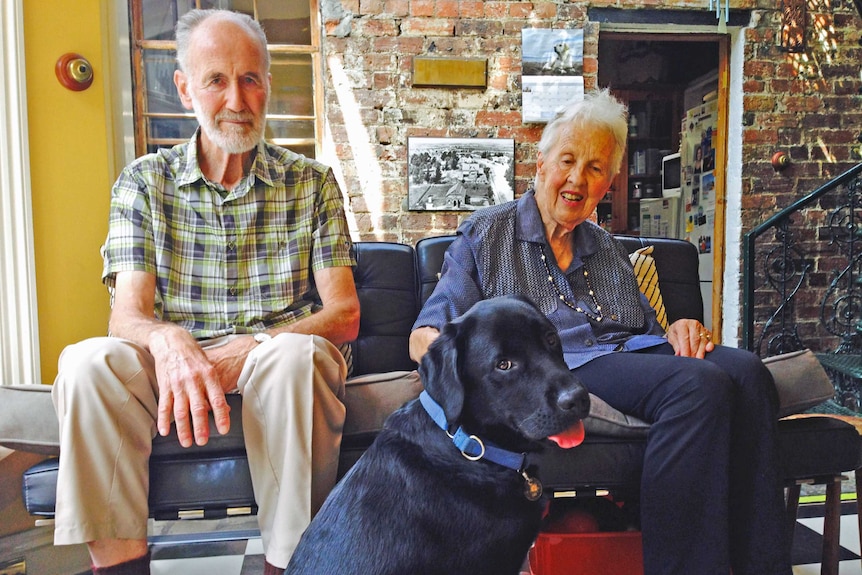Dementia carer dog Jiyu with his owners
