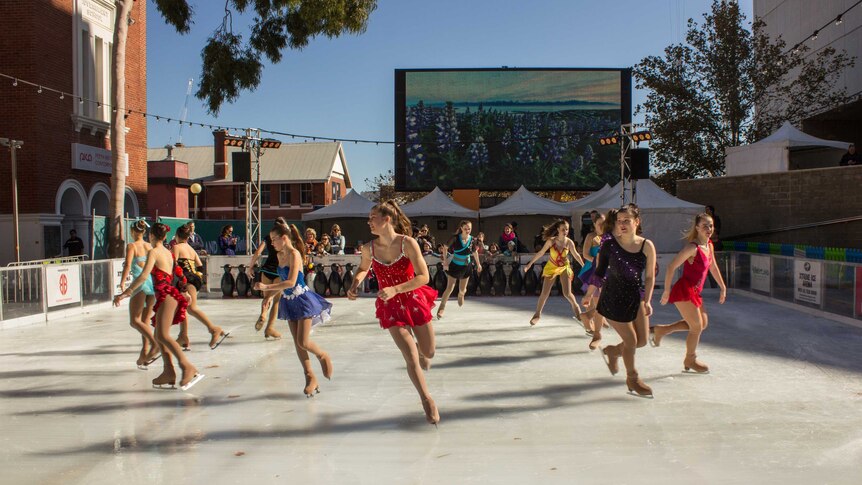 Figure skaters at the Perth cultural centre outdoor rink, 3 July 2014