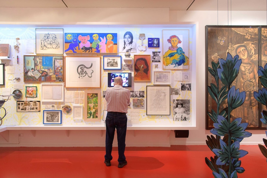 A man standing in the Mirka exhibition at Jewish Museum