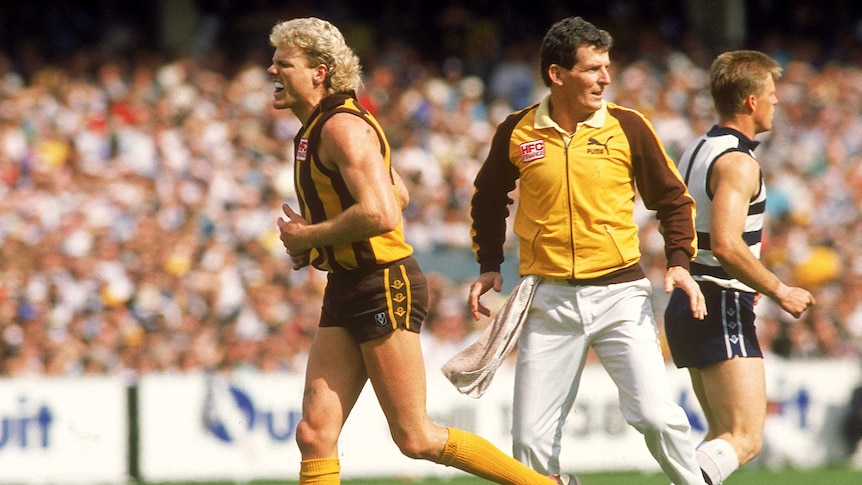 Grand final warrior ... Dermott Brereton tries to mask his physical pain during the 1989 decider