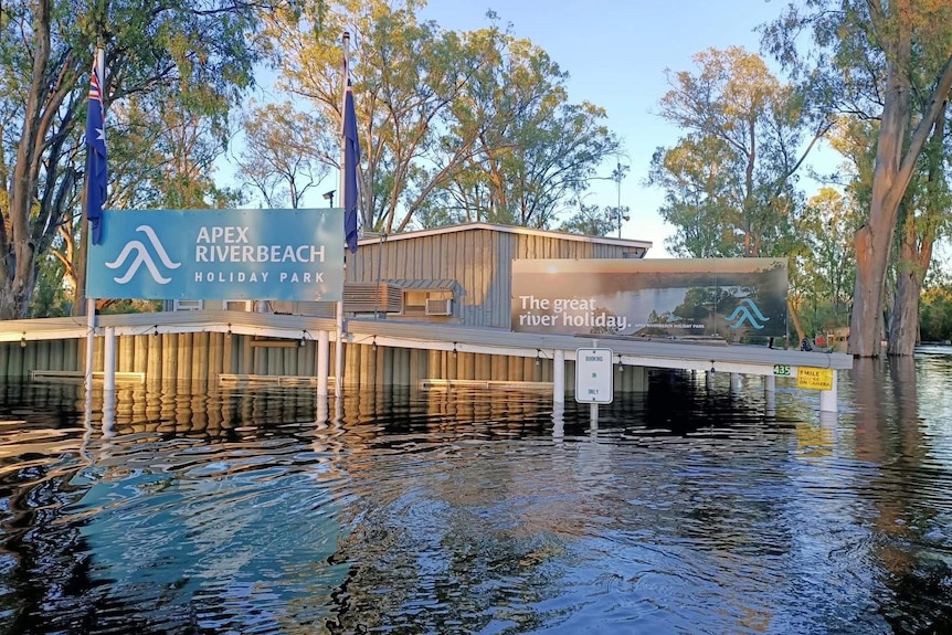 A caravan park inundated by floodwaters.