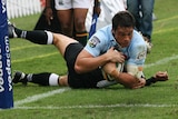 Timana Tahu dives over