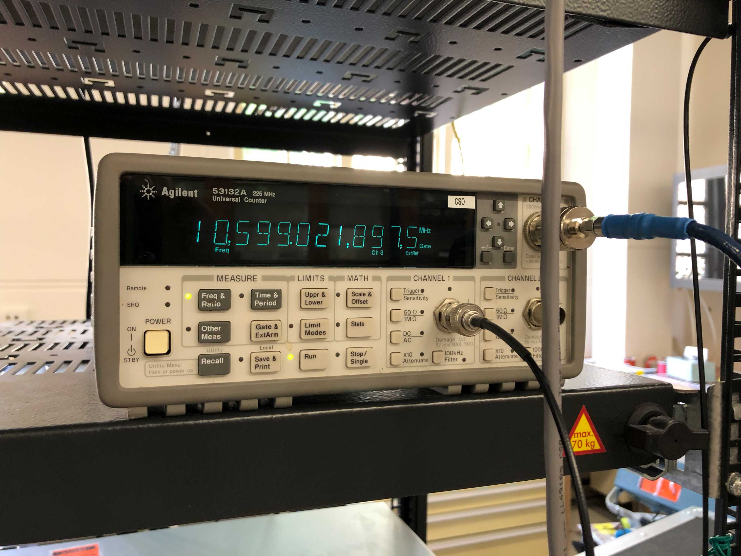 A digital screen attached to a sapphire crystal clock.