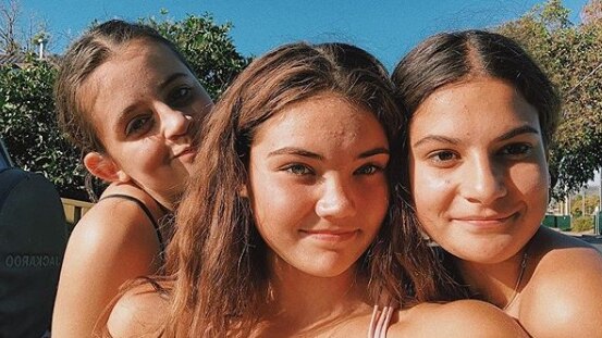 Three teenage girls