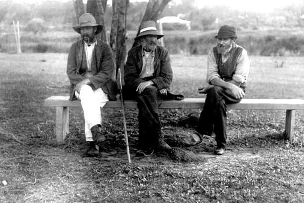 Three men at the home, 10 March 1915. Photo by L.E. Shapcott.