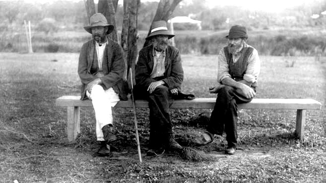Three men at the home, 10 March 1915. Photo by L.E. Shapcott.