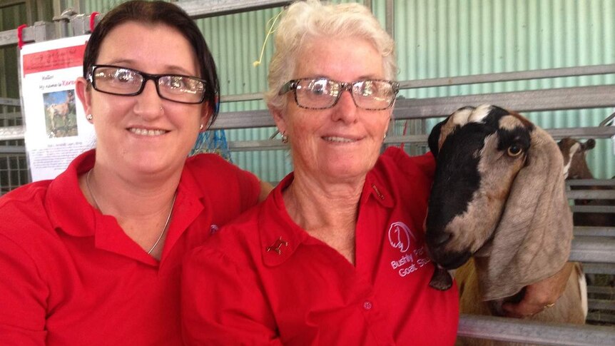 From L-R Melissa and Liz Curtis and one of their long-eared goats