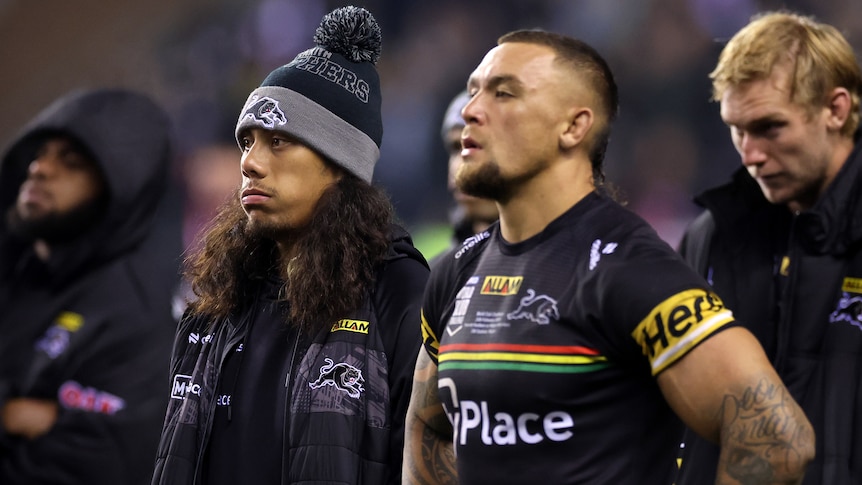 Jarome Luai and James Fisher-Harris stand together after World Club challenge.