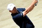 Spieth hits out of the sand