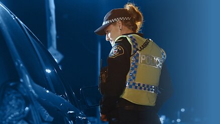 Tasmania Police officer at traffic stop, generic image.