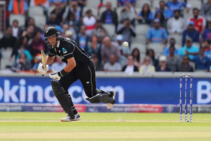 Ross Taylor watches the ball and takes off for a run