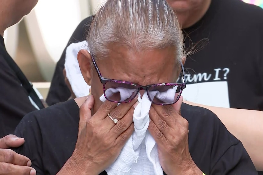 Joanne Rivers crying outside of court