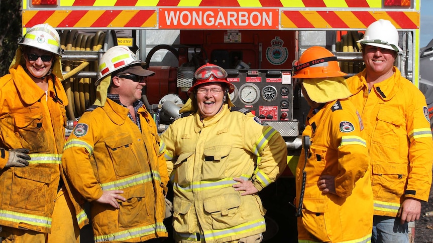 Carole shares a laugh with her fire-fighting team