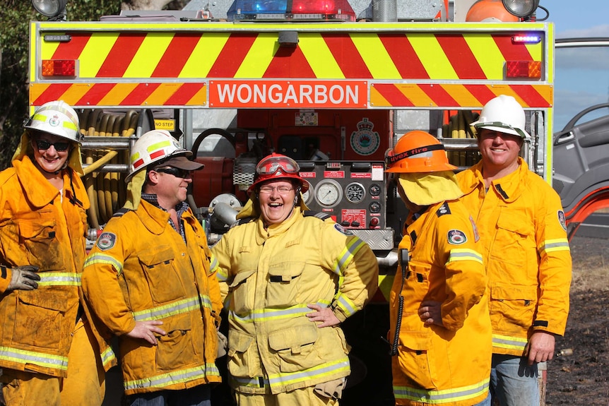 Carole shares a laugh with her fire-fighting team
