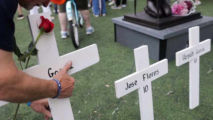 Crosses with the names of victims of Uvalde, Texas, school shooting are seen during the "March for Our Lives" rally