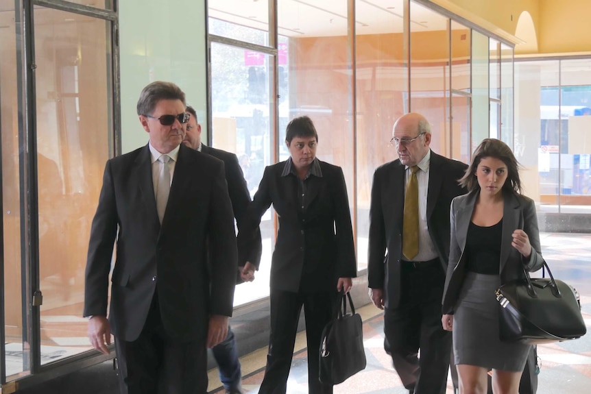 Sergeant Sheree Bissett (centre) at the Downing Centre Court in Sydney.