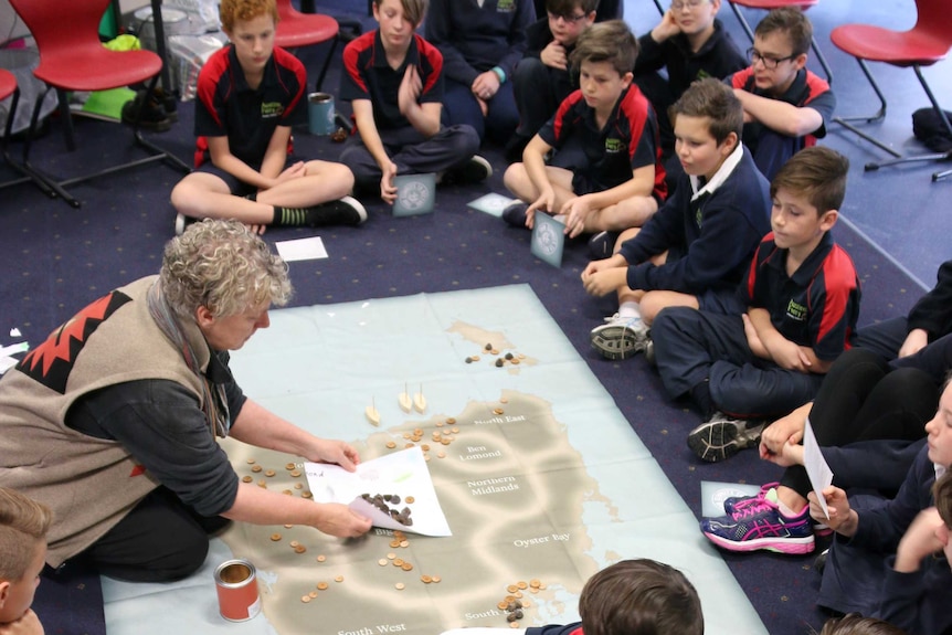 Students at Austins Ferry Primary School watch the teacher conduct Gumnuts to Buttons class.