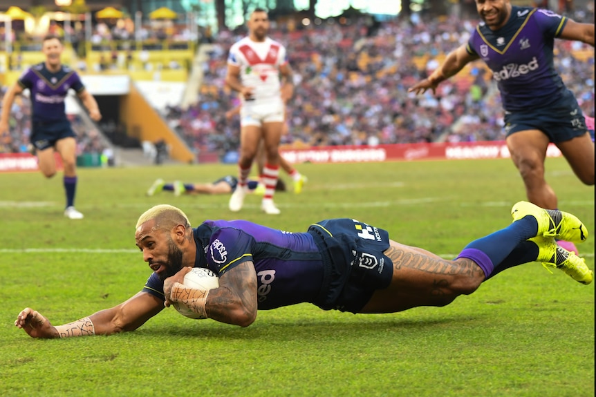 Melbourne Storm winger Josh Addo-Carr scores a try in the NRL game against St George Illawarra Dragons.