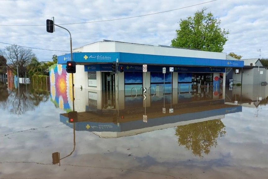 A flooded pharmacy in a country town.