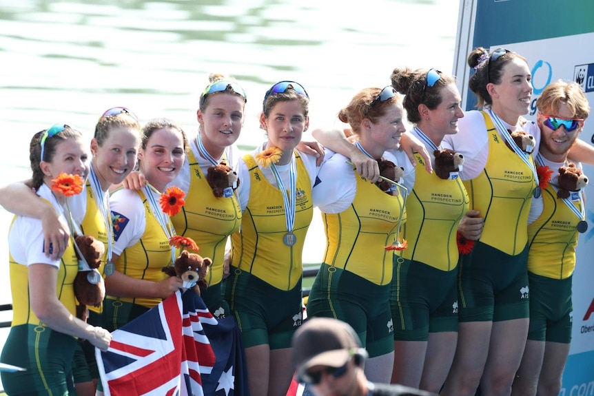 Australia's women's eight rowing team with their silver medals at 2019 World Rowing Championships.