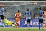 Adrian Mierzejewski scores from the penalty spot for Sydney FC against Brisbane Roar.