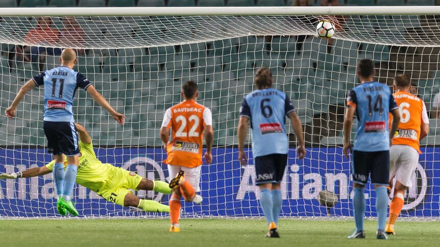 Adrian Mierzejewski scores from the penalty spot for Sydney FC against Brisbane Roar.