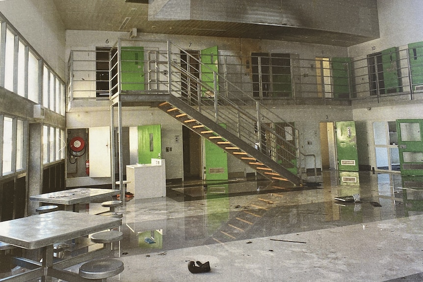 Damage from a fire in a prison common space.