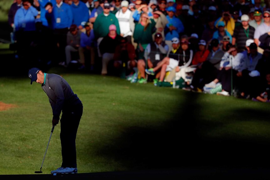Jordan Spieth putts at the Masters