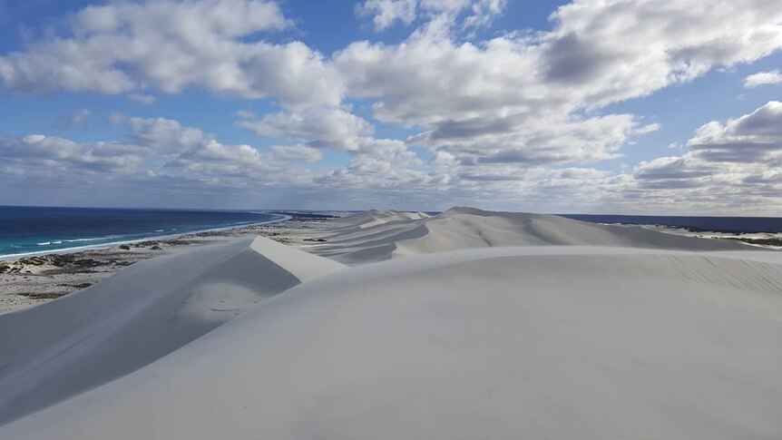 Sand dunes stretch as far as eye can see