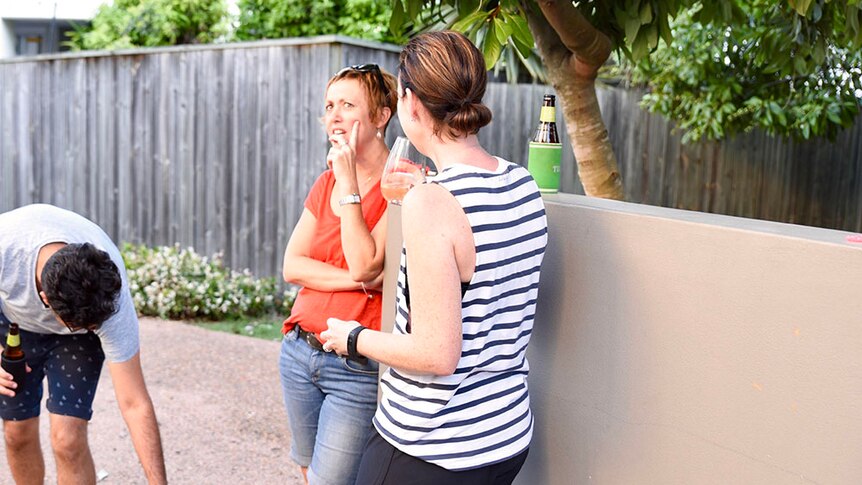 Michelle MacFarlane talks to a neighbour