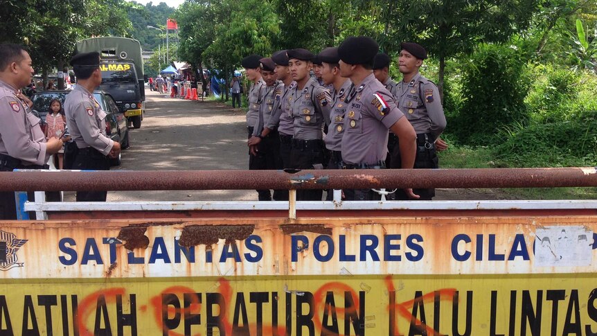 Indonesian police line street in Cilacap
