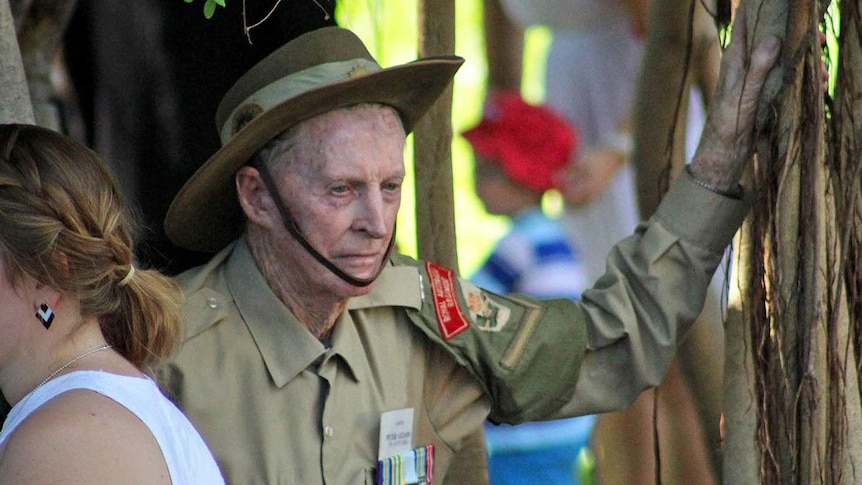 Peter Gulson rests after the Anzac Day parade.
