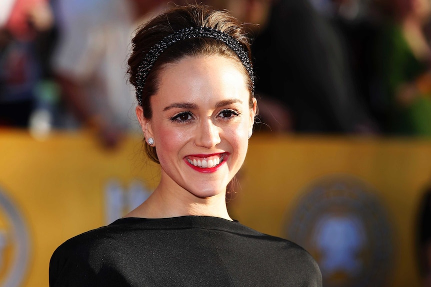 Actress Heather Lind arrives at the 18th annual Screen Actors Guild Awards.