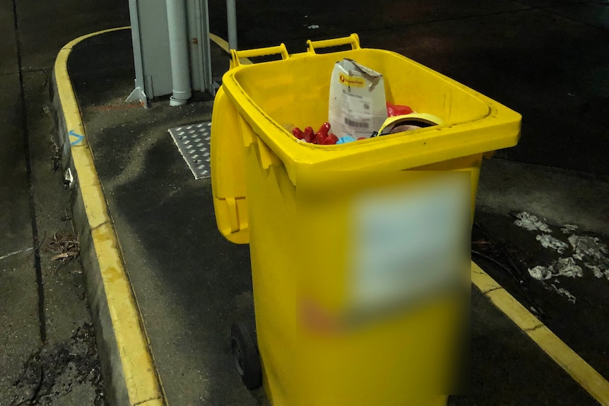 A yellow bin. 