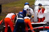 Formula One driver Jules Bianchi receives urgent medical attention after crash at Japanese Grand Prix