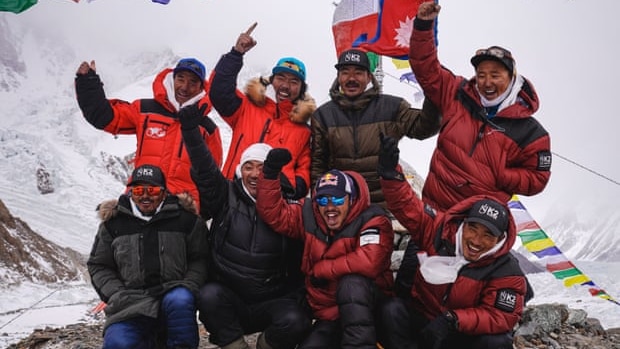 Nimsdai Purja and his team celebrate reaching the summit of K2
