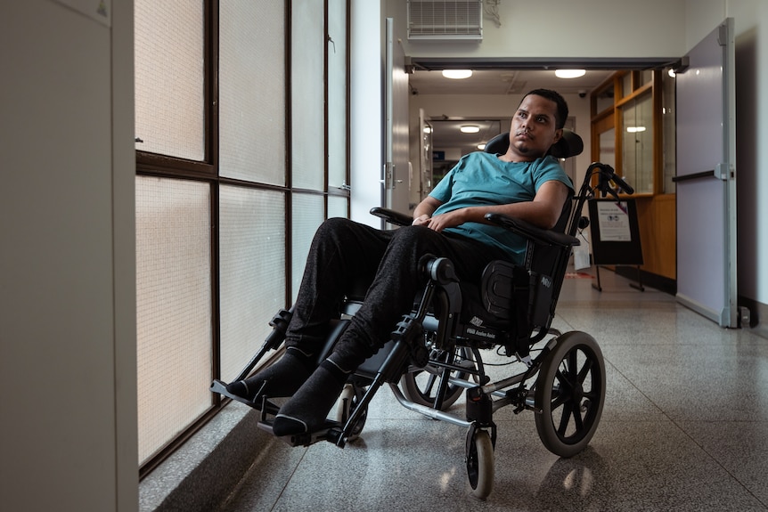 A man in a wheelchair.