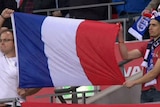 English soccer fans salute France at Wembley Stadium