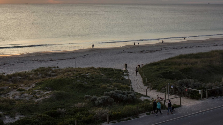 Walkers at Leighton Beach, North Fremantle.